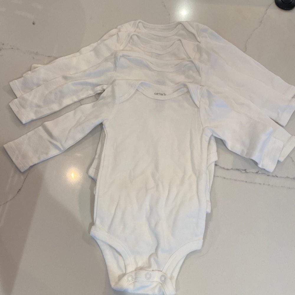 Carter’s, 4 pack long sleeve onesies